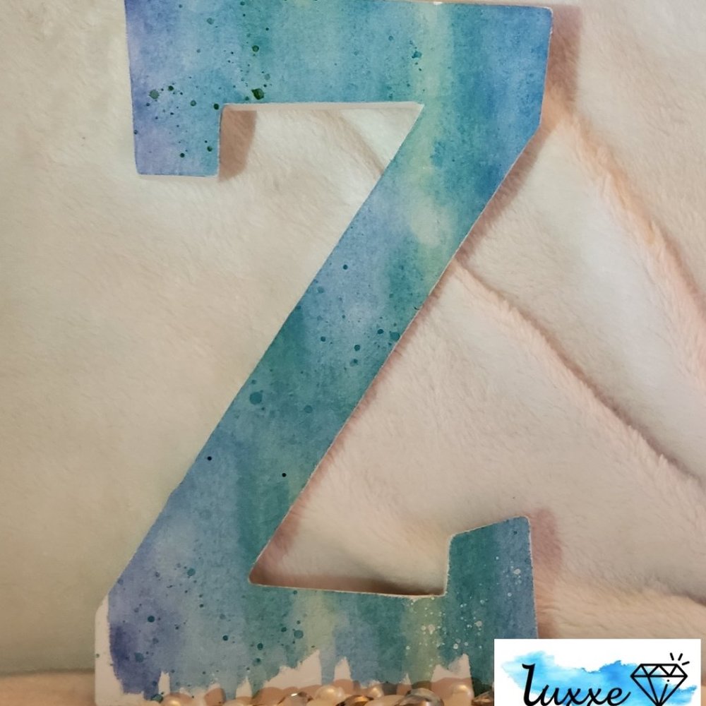 Melting Wooden Letter